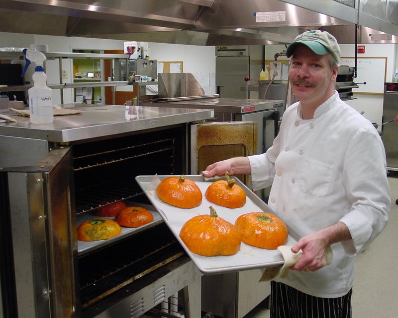 man with pumpkins