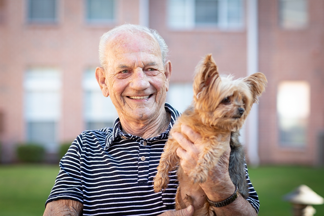 resident with dog