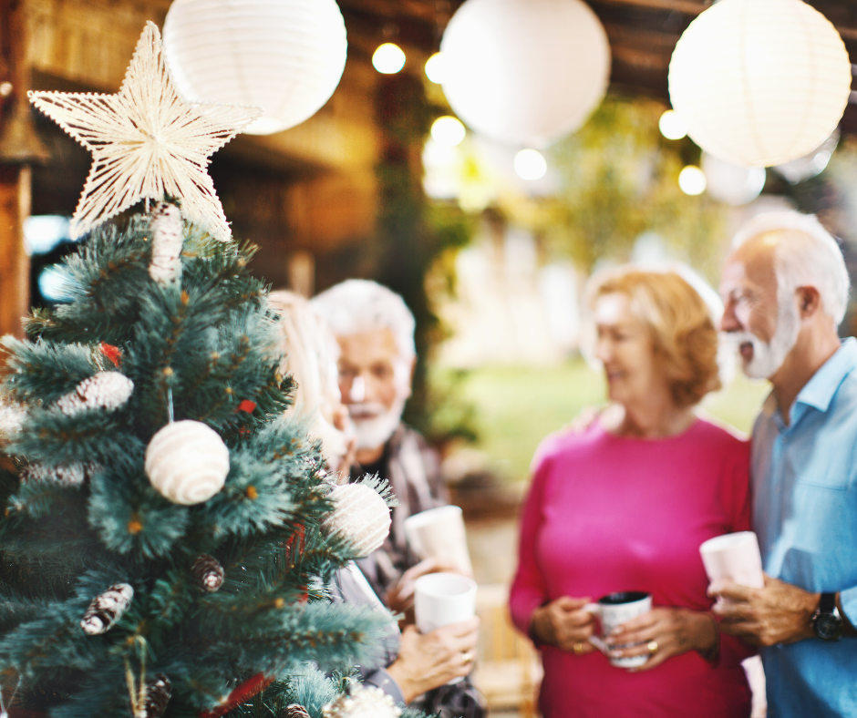 residents decorating Christmas tree